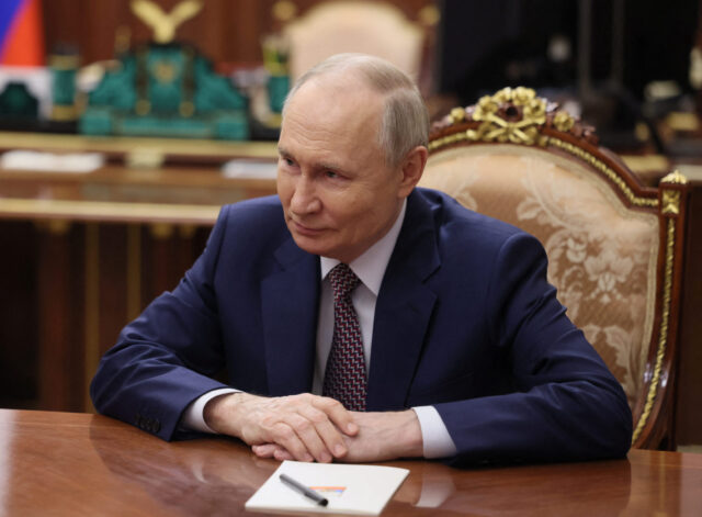 Russian President Vladimir Putin meets with Irina Gekht, newly appointed Acting Governor of Nenets Autonomous Area, in Moscow